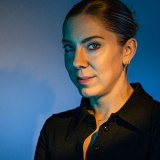 Photograph of Kaitlin Peterson at her workstation